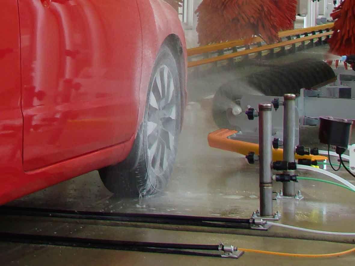 Chemical Tire Applicator foaming wheel cleaning unit for car wash tunnels.